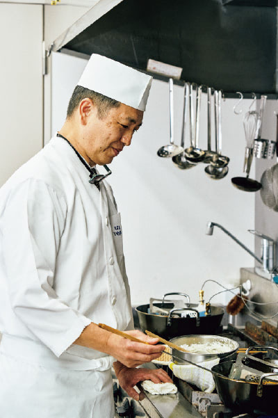 A production chef at the fry line in a Japanese kitchen using Dr. Fry